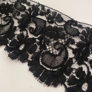 3” (11 yards) BLACK LACE w/ straight edge on one side & scallops on the border.